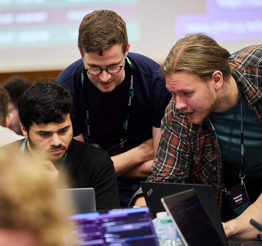 Image of three people at Nextflow Summit Hackathon